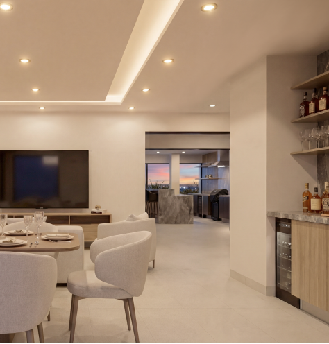 Comedor con cava y bar de un departamento en Campestre Views
